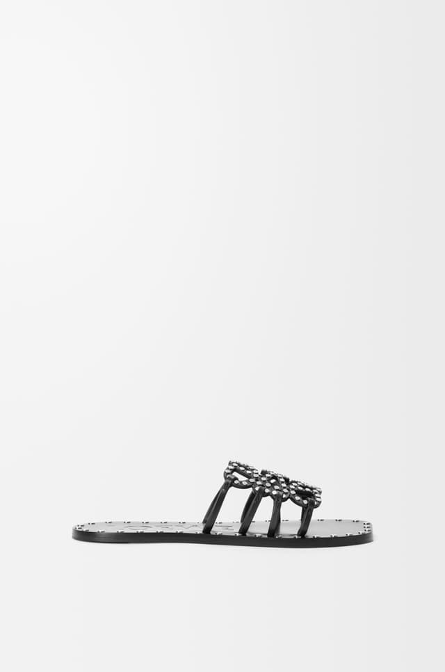 LOEWE Petal Anagram slide in vegetable-tanned calfskin and metallic studs