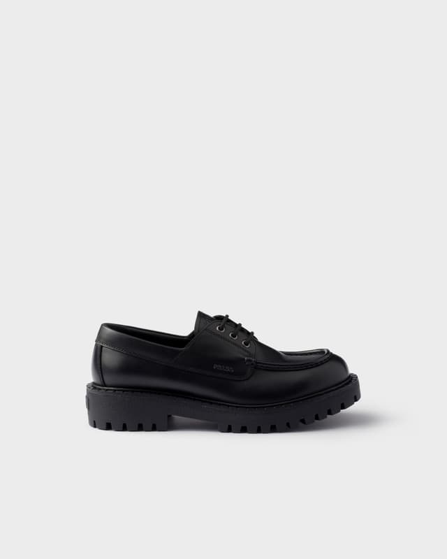 Prada Laced leather loafers