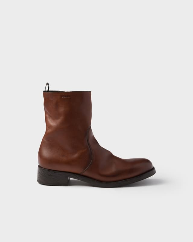 Prada Leather zipper boots